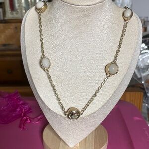 Elegant Gold and White Necklace